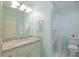 Bright bathroom with granite counters, glass enclosed shower and toilet at 3928 White Chapel Way, Raleigh, NC 27615