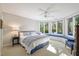This bright bedroom features large bay windows, built in seating and carpet floors at 3928 White Chapel Way, Raleigh, NC 27615