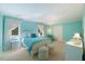 Bright bedroom with two windows, beautiful aqua walls and carpet floors at 3928 White Chapel Way, Raleigh, NC 27615