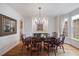 Formal dining room with hardwood floors and large windows at 3928 White Chapel Way, Raleigh, NC 27615
