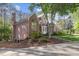 Beautiful brick house with arched windows and mature landscaping at 3928 White Chapel Way, Raleigh, NC 27615