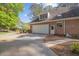 This rear-entry garage features a multi-car garage, a driveway, and a single-entry door at 3928 White Chapel Way, Raleigh, NC 27615