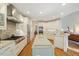 Bright, open kitchen with granite countertops and hardwood floors at 3928 White Chapel Way, Raleigh, NC 27615