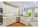 Gourmet kitchen featuring a farm sink and stainless steel appliances at 3928 White Chapel Way, Raleigh, NC 27615