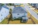Aerial view of a well-maintained home with a fenced yard and a screened-in porch at 408 Torwood Cir, Apex, NC 27523