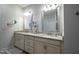 Bathroom with dual vanities, granite countertops, and modern fixtures, creating a luxurious space at 408 Torwood Cir, Apex, NC 27523