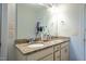 Bathroom featuring dual sinks with granite countertops and white cabinets at 408 Torwood Cir, Apex, NC 27523