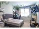 A cozy bedroom featuring charming ivy decor, computer setup and neutral tones at 408 Torwood Cir, Apex, NC 27523