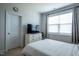 Bedroom featuring neutral decor and a large window for great natural light at 408 Torwood Cir, Apex, NC 27523