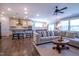 Inviting living room showcasing the open layout connecting the kitchen and cozy seating area at 408 Torwood Cir, Apex, NC 27523