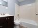 Bathroom featuring a vanity, mirror, and a shower-tub combination at 4816 Blue Bird Ct # B, Raleigh, NC 27606