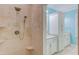 Bright bathroom featuring double sinks, granite counters, and ample storage in custom cabinets at 490 Shawnee Dr, Louisburg, NC 27549