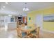 Open-concept dining area that connects the kitchen, living room and entryway at 490 Shawnee Dr, Louisburg, NC 27549