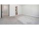 Spacious bedroom with neutral carpet and en-suite bathroom at 50 Gadwall Ct, Zebulon, NC 27597
