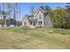 Beautiful home exterior features a well-maintained yard and manicured landscaping at 50 Gadwall Ct, Zebulon, NC 27597