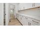 Walk-in pantry with abundant storage space and counter space in the butler's pantry at 50 Gadwall Ct, Zebulon, NC 27597
