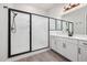 Bright bathroom featuring a large, glass-enclosed walk-in shower at 50 Gadwall Ct, Zebulon, NC 27597