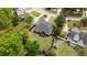 Expansive aerial view of backyard showcasing well-manicured lawn and lush landscaping at 503 Fish Pond Ct, Rolesville, NC 27571