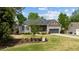 Well-maintained home with a two-car garage, covered porch, and landscaped front yard at 503 Fish Pond Ct, Rolesville, NC 27571