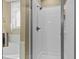 Bathroom showing a tiled stand-up shower behind a clear glass door at 503 Fish Pond Ct, Rolesville, NC 27571