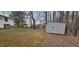 Property includes a storage shed with tree coverage at 530 Broad Rd, Roxboro, NC 27573