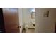 Bathroom has standard toilet and sink, with simple mirror and basic fixtures at 530 Broad Rd, Roxboro, NC 27573