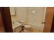 Classic bathroom with a combined shower-tub unit and neutral tile at 530 Broad Rd, Roxboro, NC 27573