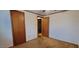 Modest bedroom includes standard ceiling fan and closet for ample storage at 530 Broad Rd, Roxboro, NC 27573