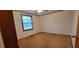 Bedroom with natural lighting, neutral color, and carpet flooring at 530 Broad Rd, Roxboro, NC 27573