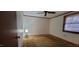 Bedroom features a simple lighting and a good view of the exterior at 530 Broad Rd, Roxboro, NC 27573