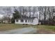 Exterior view of home showing a well kept lawn and covered porch area at 530 Broad Rd, Roxboro, NC 27573