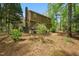 Wooded backyard with trees, plants and fence line at 5610 Frenchmans Creek Dr, Durham, NC 27713