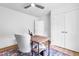 Bright home office featuring a rustic wooden desk and a comfortable chair at 5712 Wintergreen Dr, Raleigh, NC 27609
