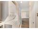 Convenient laundry area with stacked washer and dryer, maximizing space at 5804 Falls Of Neuse Rd # E, Raleigh, NC 27609