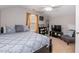 Bedroom featuring a queen bed, ceiling fan, window, and a TV at 59 Tuscarora Ln, Clayton, NC 27520