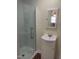 Clean bathroom featuring a glass door shower and modern vanity at 610 W Old Rd, Lillington, NC 27546