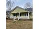 Charming single-story home featuring a quaint front porch and inviting curb appeal at 610 W Old Rd, Lillington, NC 27546