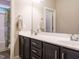 Bathroom with double vanity, and a bathtub/shower behind a curtain at 65 N Wilders Ridge Way, Clayton, NC 27527