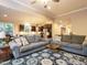 Open concept living room and kitchen area with hardwood floors at 65 N Wilders Ridge Way, Clayton, NC 27527