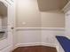 Mudroom featuring a bench, storage, and wood floors, blending function with style at 65 N Wilders Ridge Way, Clayton, NC 27527