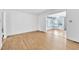 Bright living room with hardwood floors and white walls at 6709 Johnsdale Rd, Raleigh, NC 27615