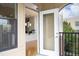 Balcony view showcasing an open doorway, wood floors, and a stylish interior at 700 Finsbury St # 306, Durham, NC 27703