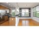 Kitchen boasts stainless steel appliances, granite countertops, and pendant lighting at 700 Finsbury St # 306, Durham, NC 27703