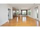 Spacious living area with an open kitchen and access to a balcony at 700 Finsbury St # 306, Durham, NC 27703