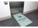 Entrance mat with 'Davis Park' logo in front of a modern elevator at 700 Finsbury St # 306, Durham, NC 27703