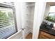 Bright pantry with adjustable wire shelves, window, and wood flooring for organized storage at 700 Finsbury St # 306, Durham, NC 27703