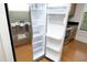Stainless steel refrigerator showcasing spacious interior storage and modern design elements at 700 Finsbury St # 306, Durham, NC 27703