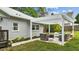 The backyard features a covered seating area at 703 E Horne St, Clayton, NC 27520