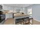 Charming kitchen with a center island, breakfast bar, and open layout at 703 E Horne St, Clayton, NC 27520