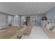 Spacious main bedroom featuring decor, ample closet space and a connecting en suite bathroom for convenience and privacy at 703 E Horne St, Clayton, NC 27520